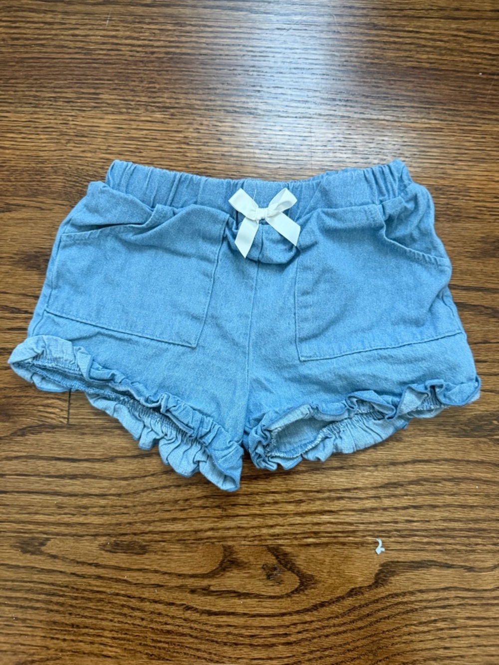 Nicole Miller Light Blue Denim-Look Ruffle Shorts with Cream Bow